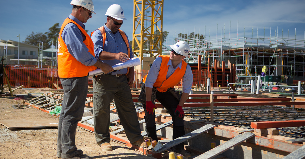 Construction professionals working on site